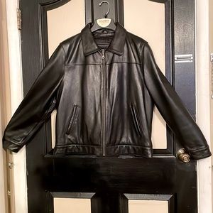 Wilsons Leather coat, women’s size large and black color.